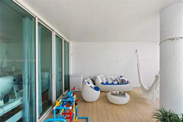 a view of a hallway with washer and dryer