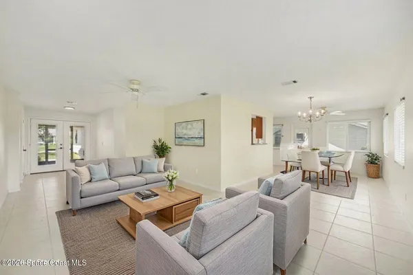 a view of a livingroom with a kitchen