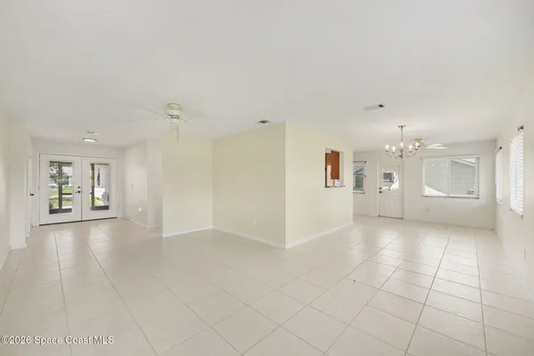 a view of a kitchen with a sink and cabinet