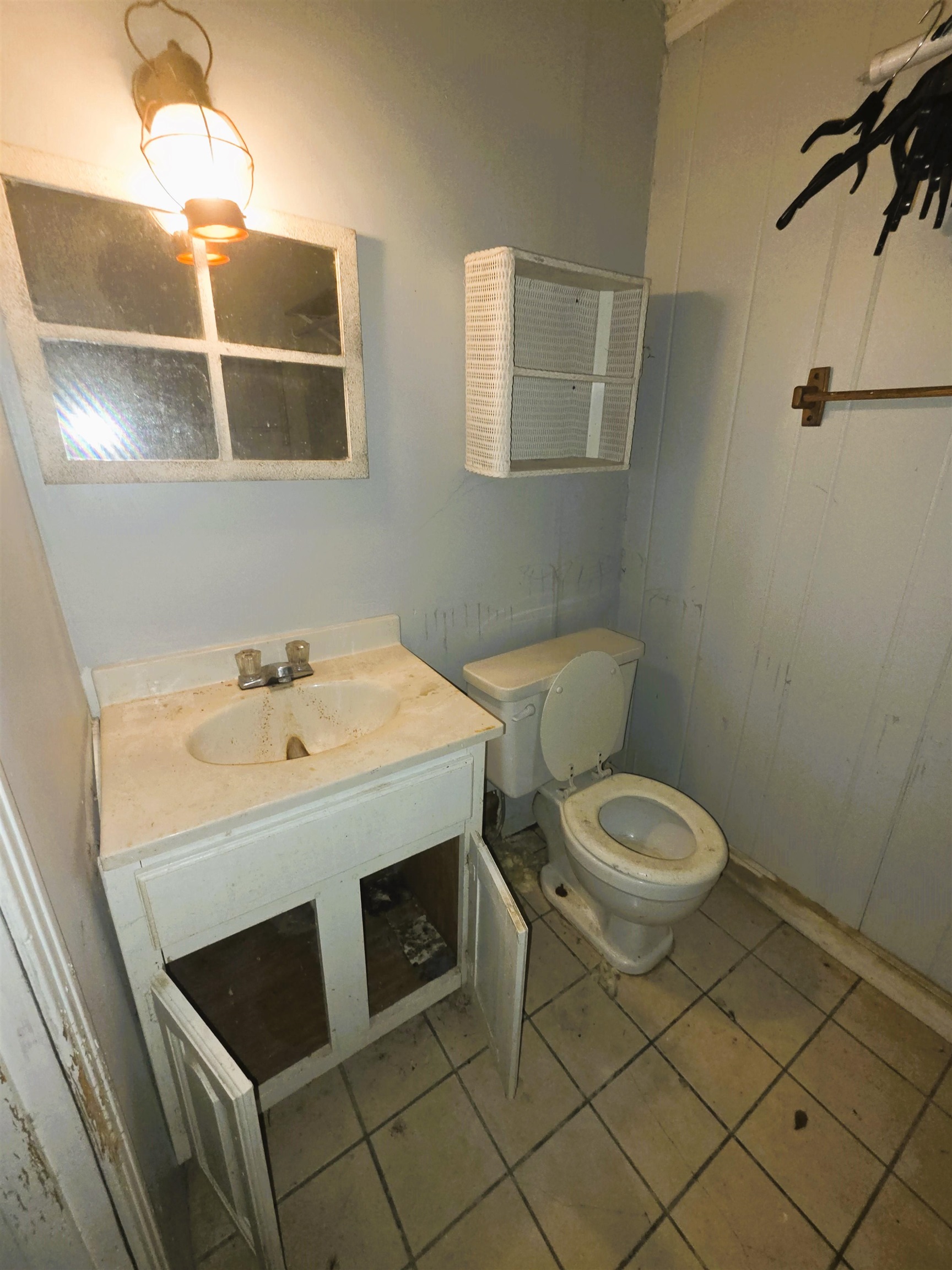 6751 Navy Road Millington, TN 38053 - Photo 12 of 14 a bathroom with a sink toilet and mirror