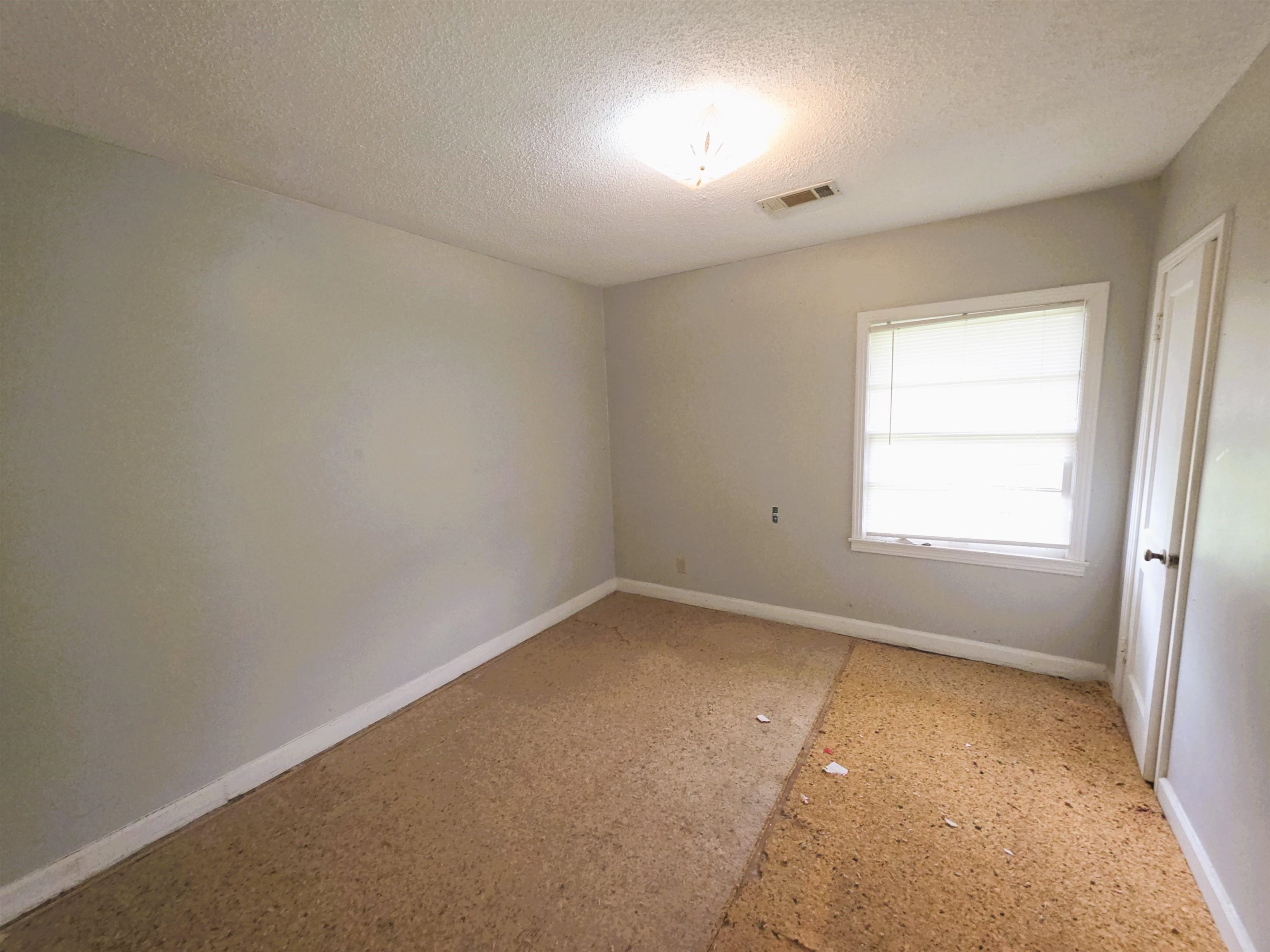 6751 Navy Road Millington, TN 38053 - Photo 7 of 14 an empty room with a window