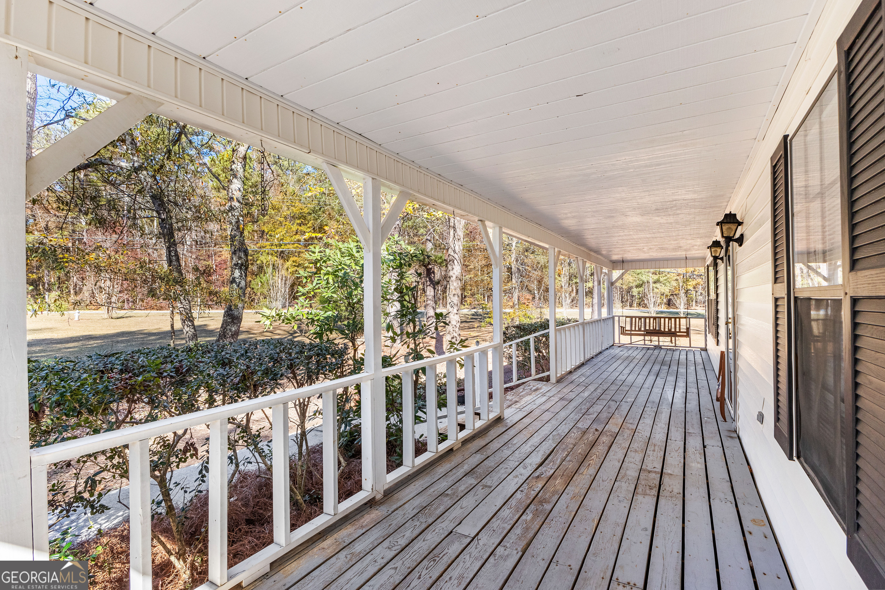 75 Antioch Road McDonough, GA 30252 - Photo 26 of 40 a view of a balcony with wooden floor