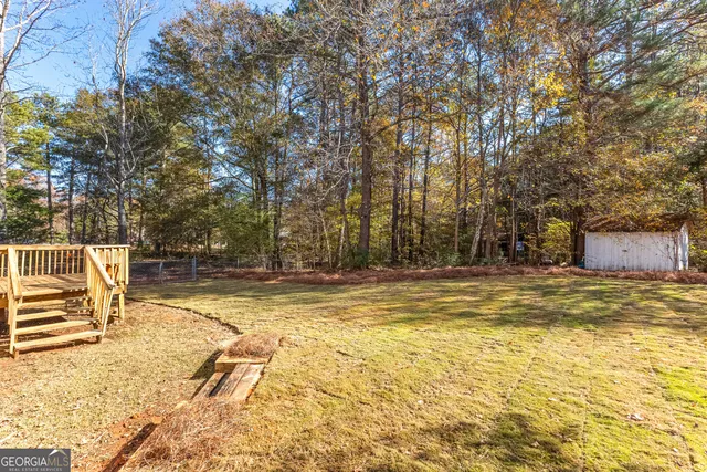 a view of a swimming pool with an outdoor space