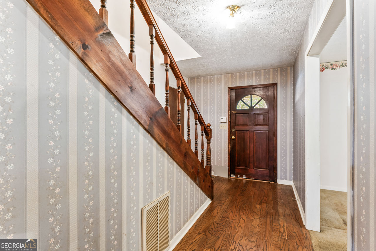 75 Antioch Road McDonough, GA 30252 - Photo 3 of 40 a view of an entryway with wooden floor