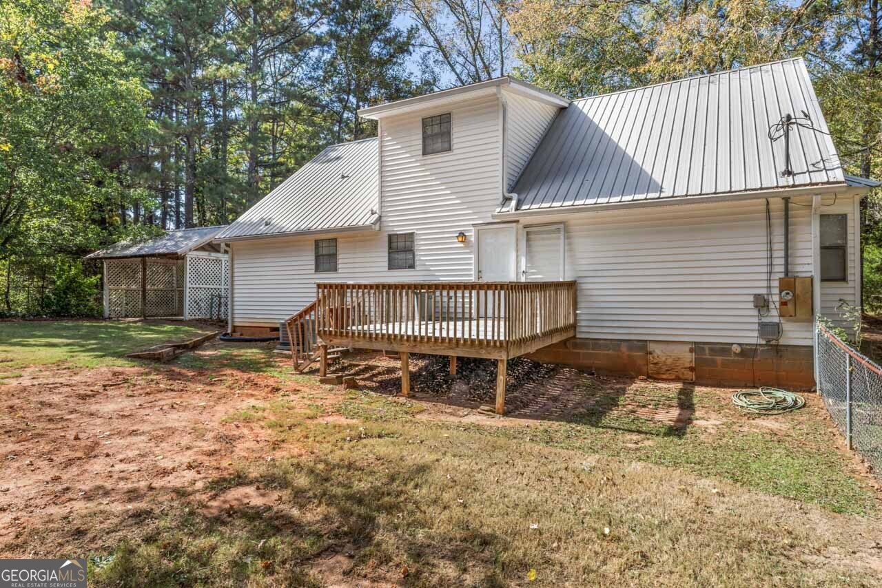 75 Antioch Road McDonough, GA 30252 - Photo 34 of 40 a view of a house with backyard and sitting area