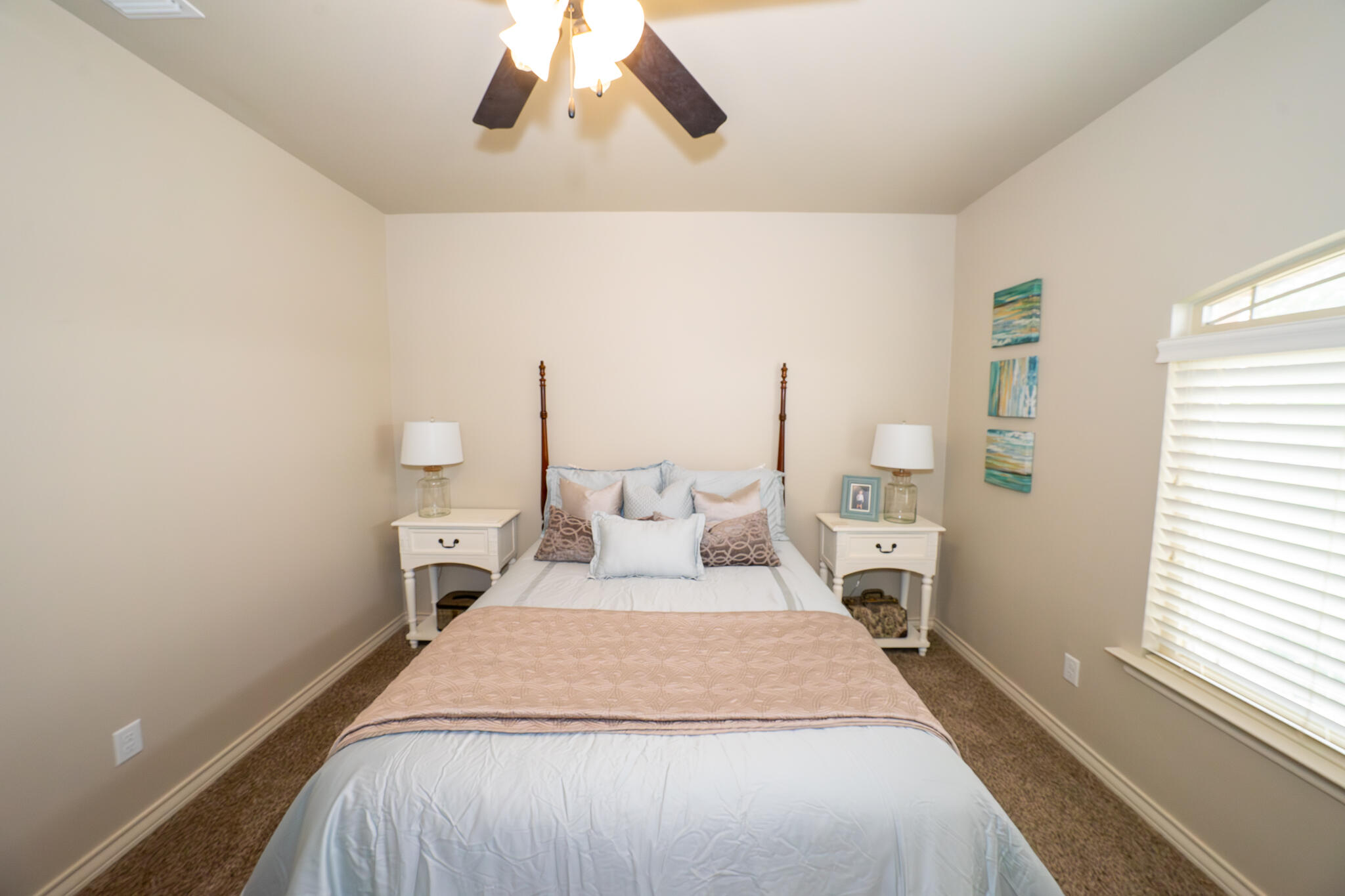 3301 County Road 7560 Lubbock, TX 79423 - Photo 22 of 40 a bedroom with a bed and window