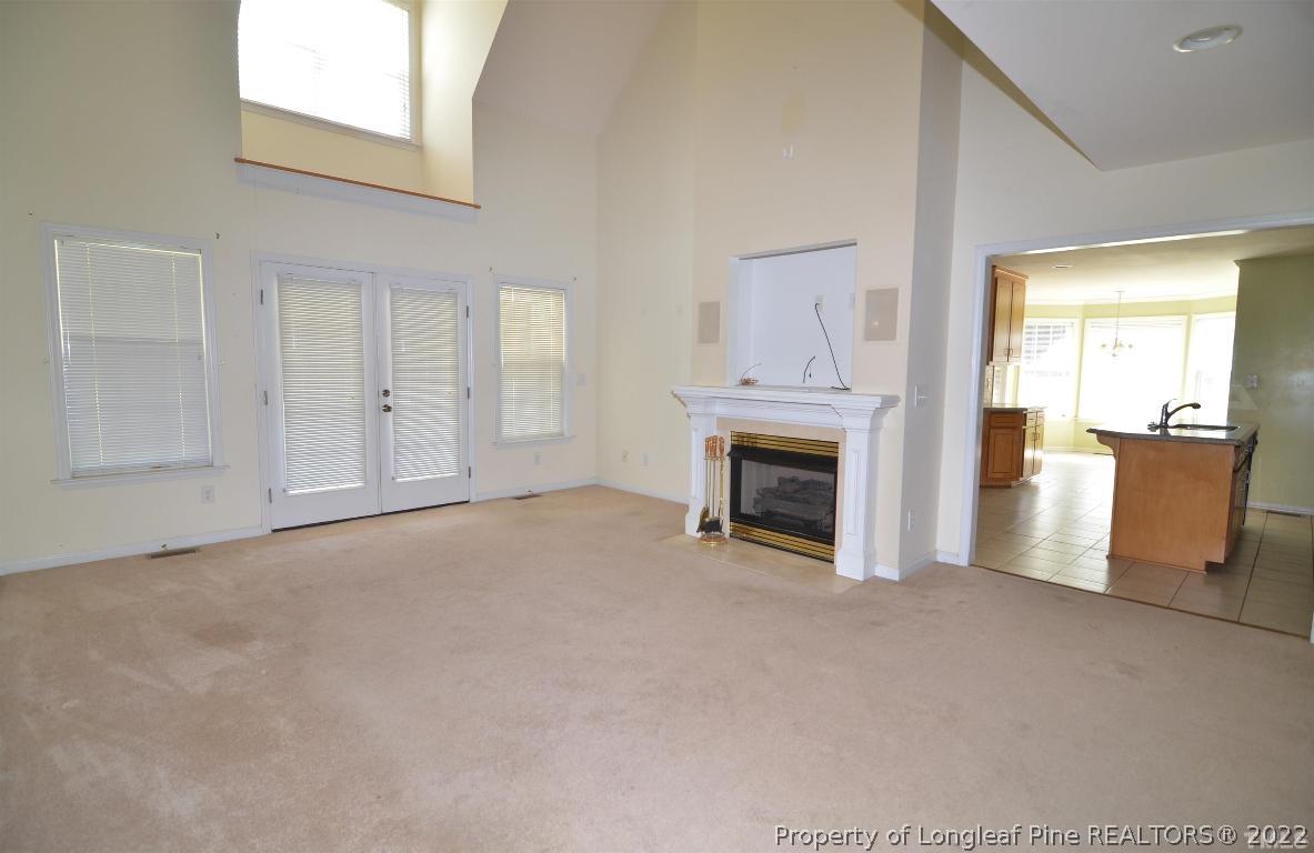 75 Natalie Drive Raleigh, NC 27603 - Photo 11 of 24 a view of a livingroom with a fireplace