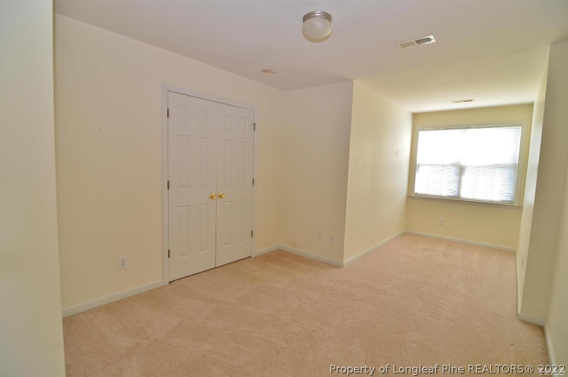 75 Natalie Drive Raleigh, NC 27603 - Photo 15 of 24 an empty room with windows