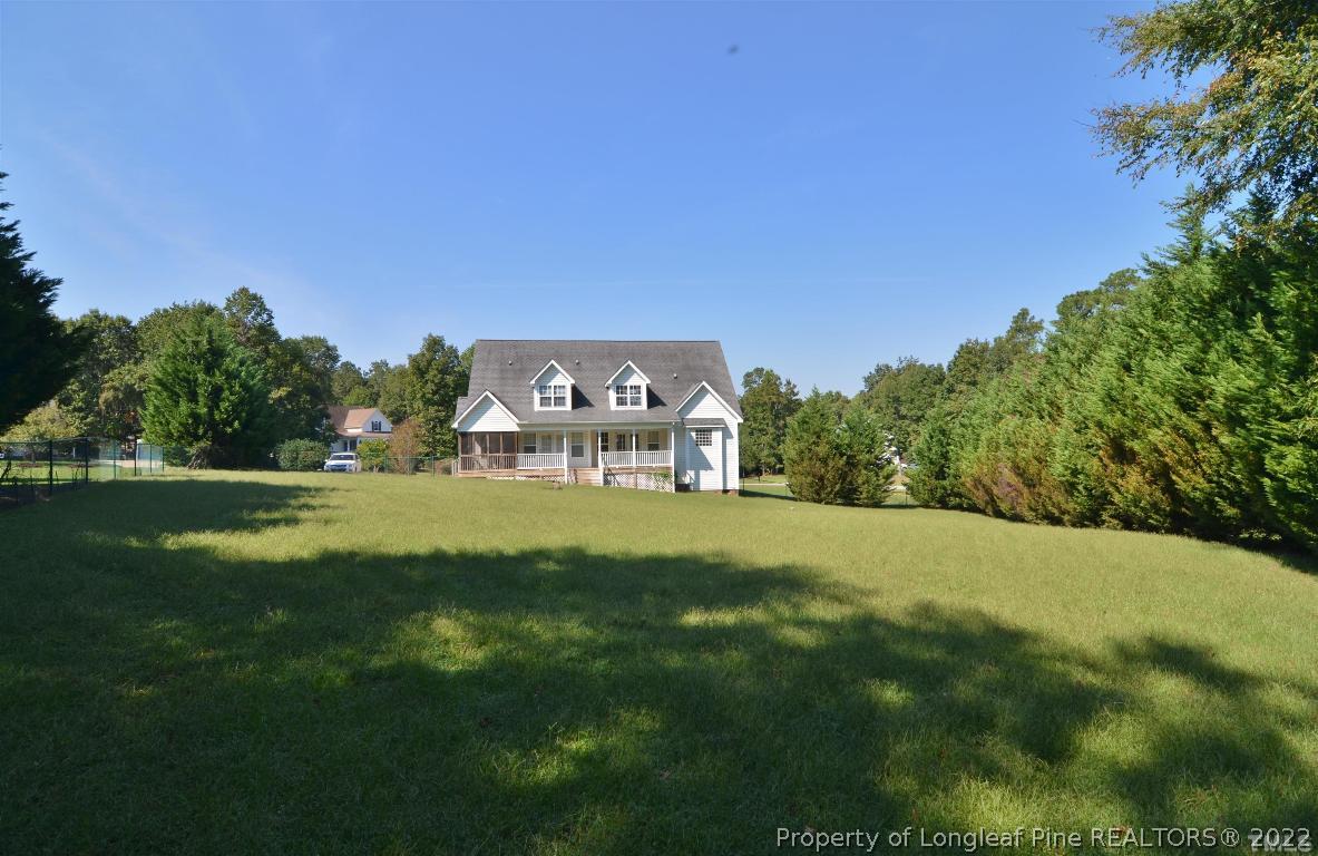 75 Natalie Drive Raleigh, NC 27603 - Photo 5 of 24 a view of a house with a big yard