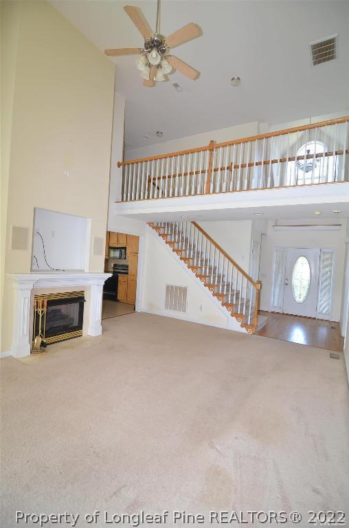 75 Natalie Drive Raleigh, NC 27603 - Photo 9 of 24 a view of a livingroom with a fireplace