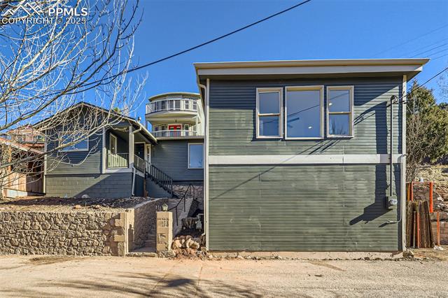 33 Cherokee Road Manitou Springs, CO 80829 - Photo 27 of 37 View of front of property featuring stairs