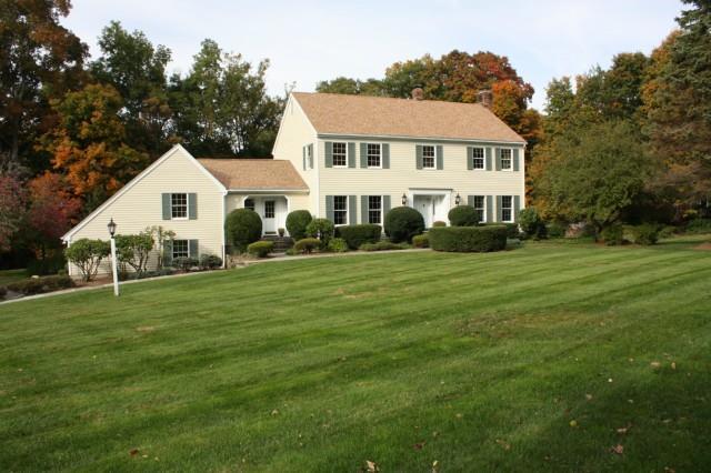 47 East Farm Lane Ridgefield, CT 06877 - Photo 1 of 1 a front view of a house with a garden