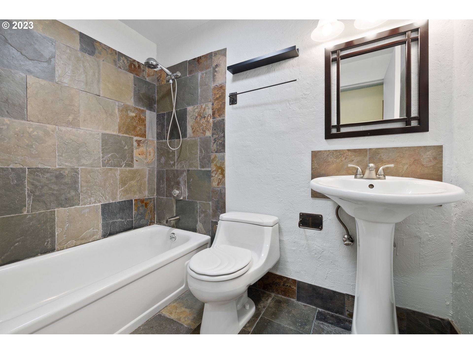 1757 Southwest 19th Court Gresham, OR 97080 - Photo 13 of 31 a bathroom with a sink toilet and shower
