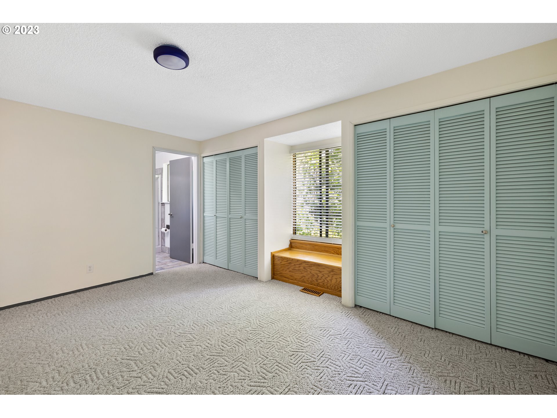 1757 Southwest 19th Court Gresham, OR 97080 - Photo 14 of 31 a view of an empty room with a fireplace