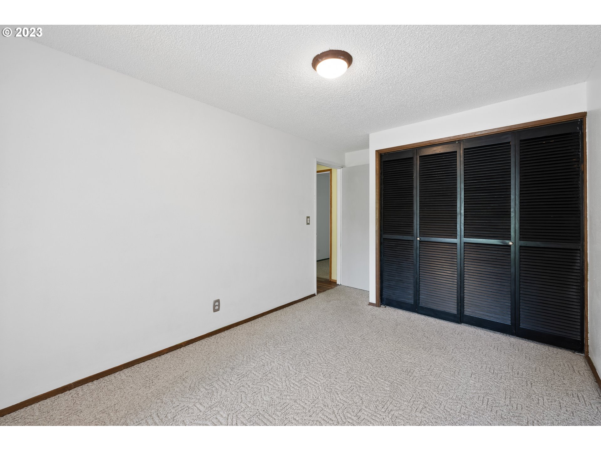 1757 Southwest 19th Court Gresham, OR 97080 - Photo 20 of 31 a view of an empty room with a window