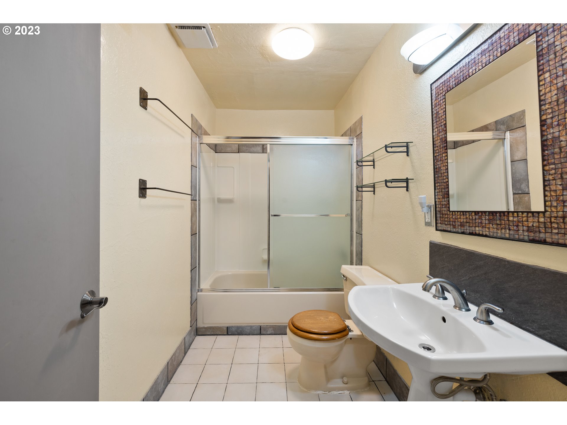 1757 Southwest 19th Court Gresham, OR 97080 - Photo 21 of 31 a bathroom with a sink toilet and shower