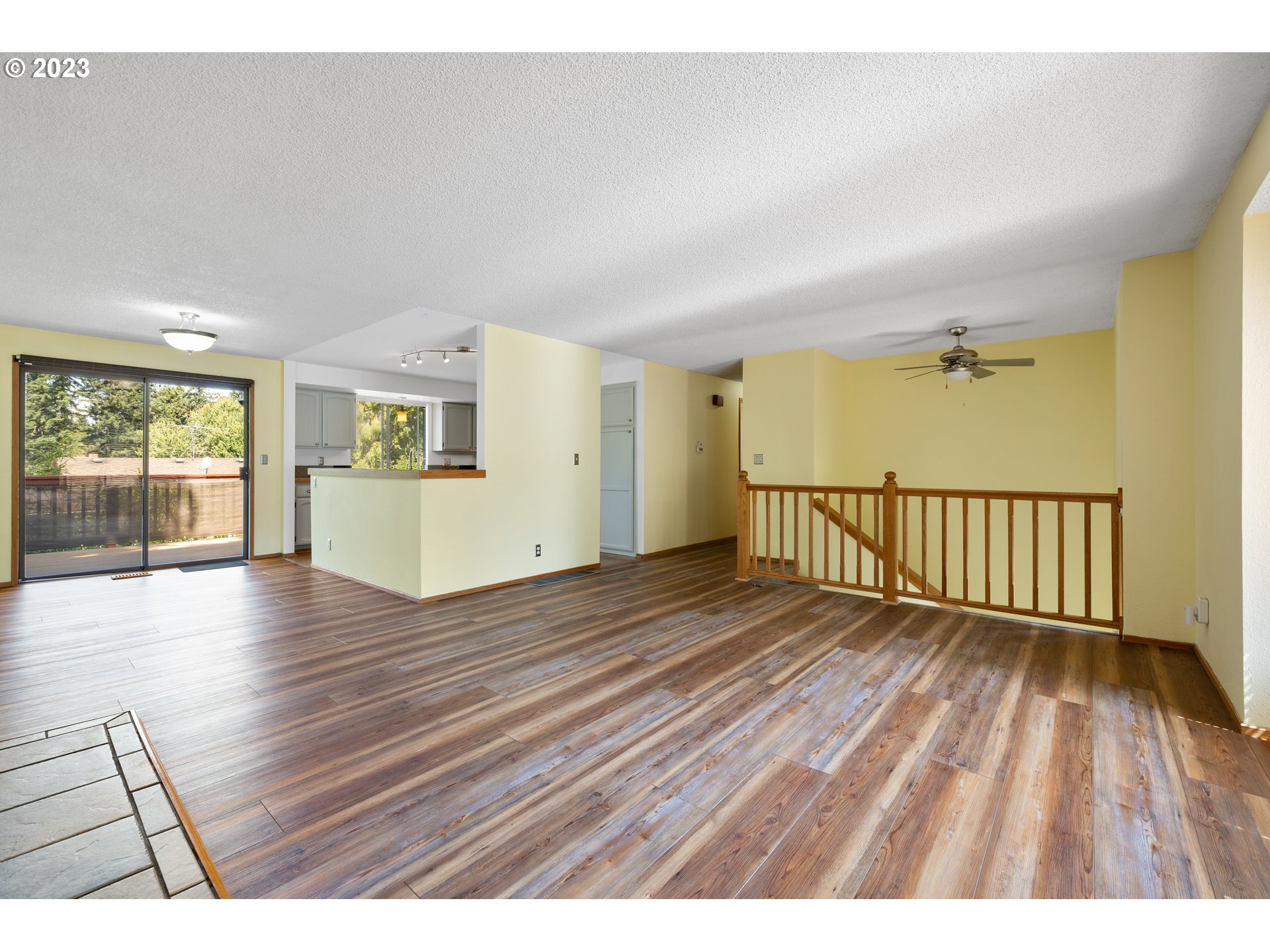 1757 Southwest 19th Court Gresham, OR 97080 - Photo 8 of 31 wooden floor in an empty room with a window