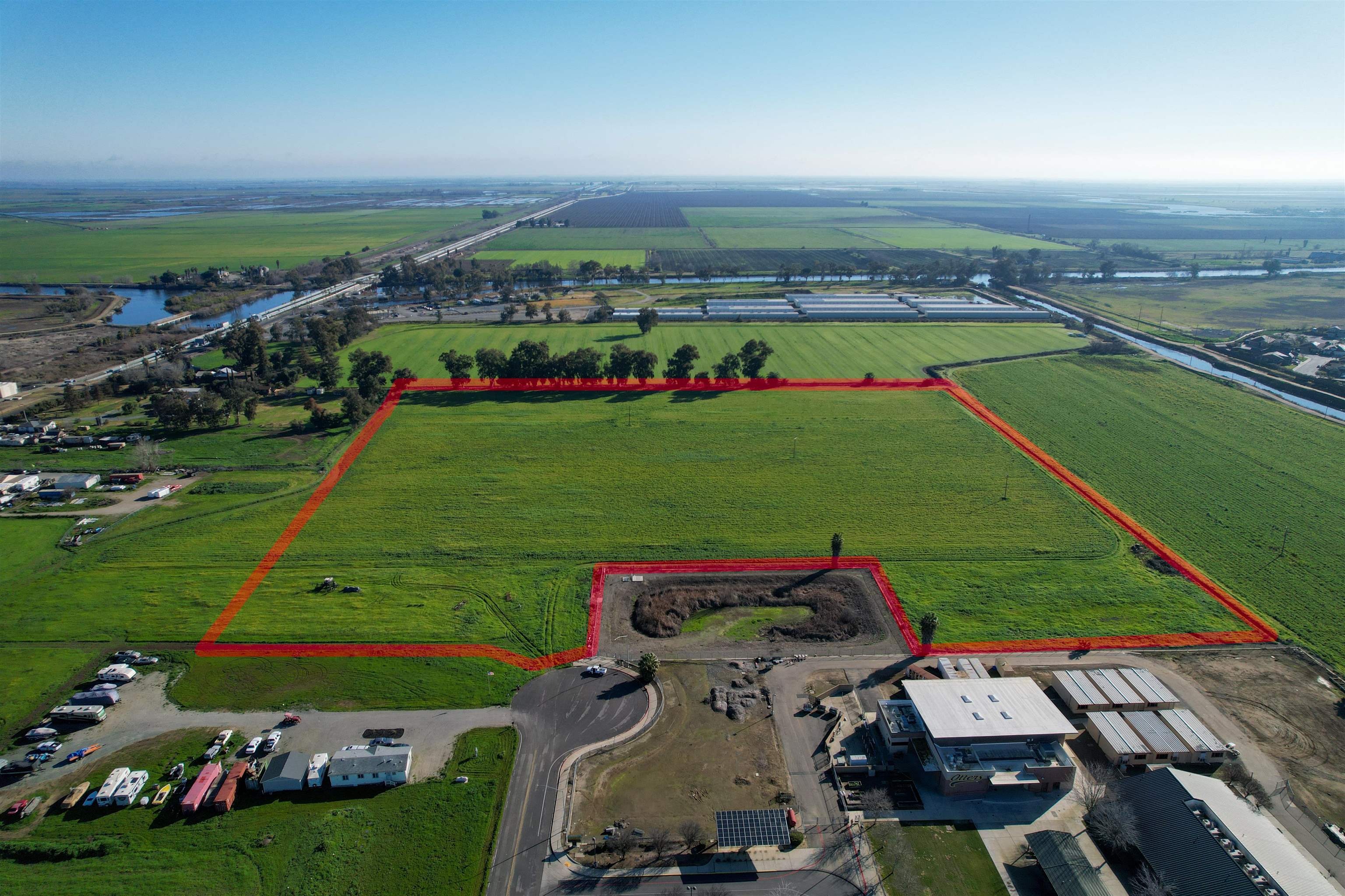 View of rural area with extensive farmland and property parcel outlined