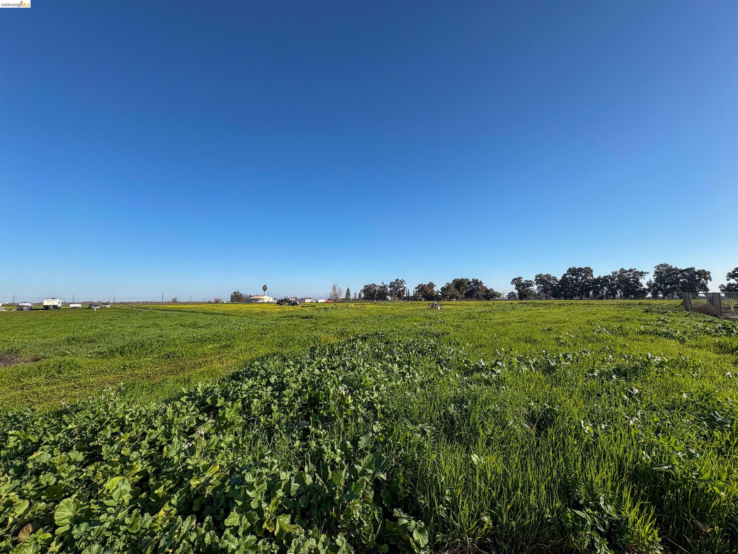 0 Learning Tree Lane Brentwood, CA 94513 - Photo 16 of 18 a view of a field with an outdoor space and seating