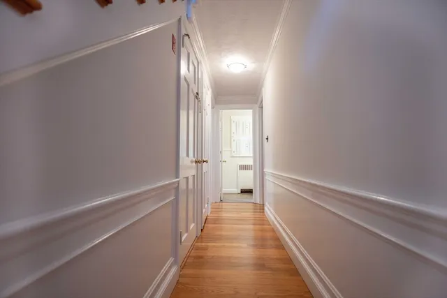 a view of a bathroom with a shower and a sink