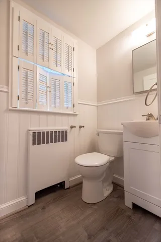 a bathroom with a toilet and a sink
