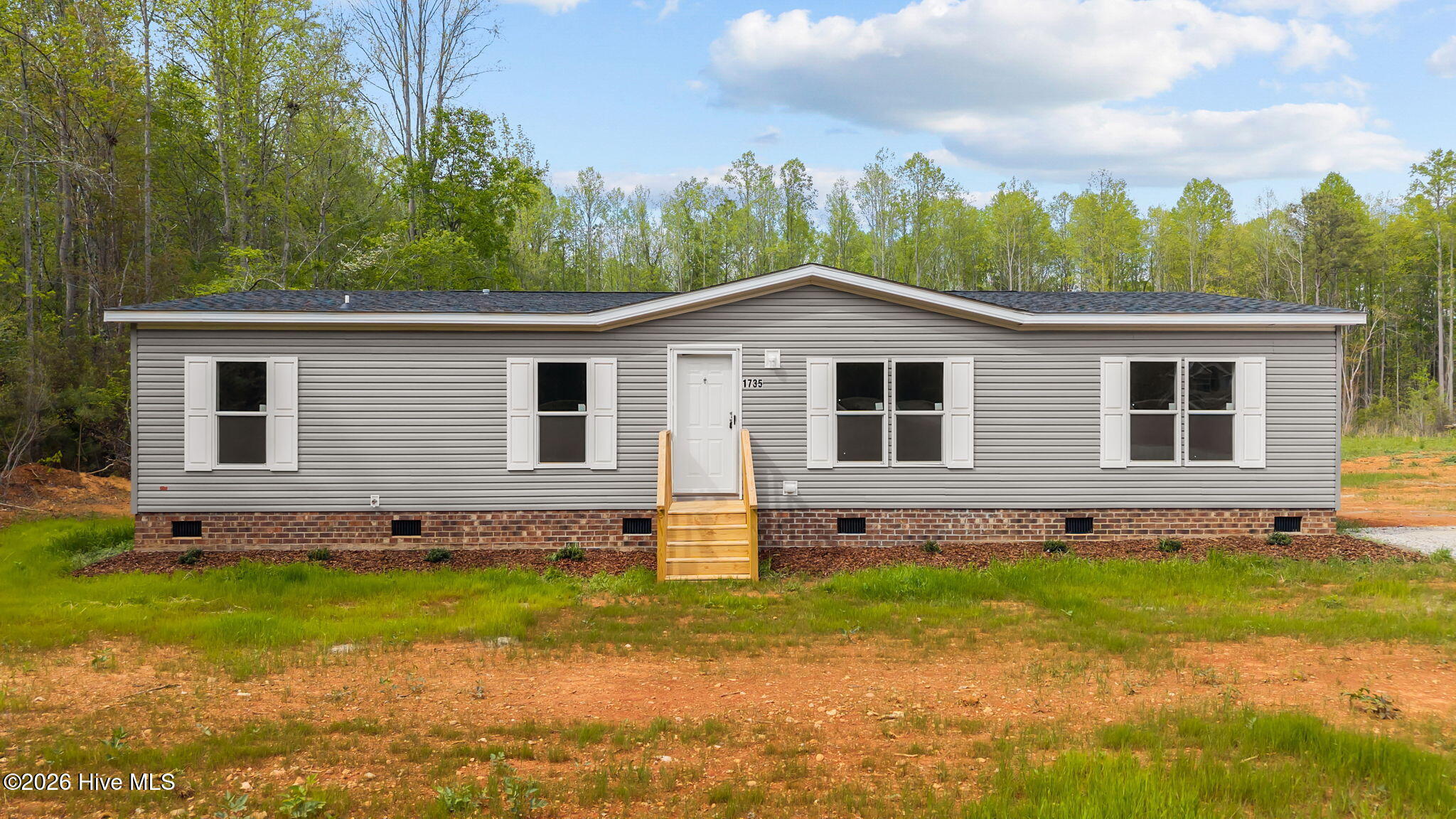 1735 Lynch Road Hollister, NC 27844 - Photo 4 of 37 1-web-or-mls-DJI_20260406153426_0089_D