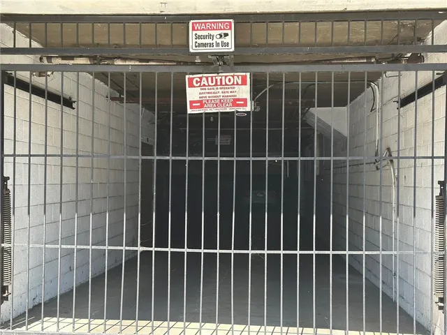 a view of a studio with wooden floor