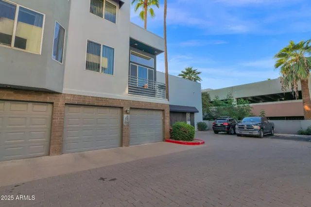 a view of a street with a parked car