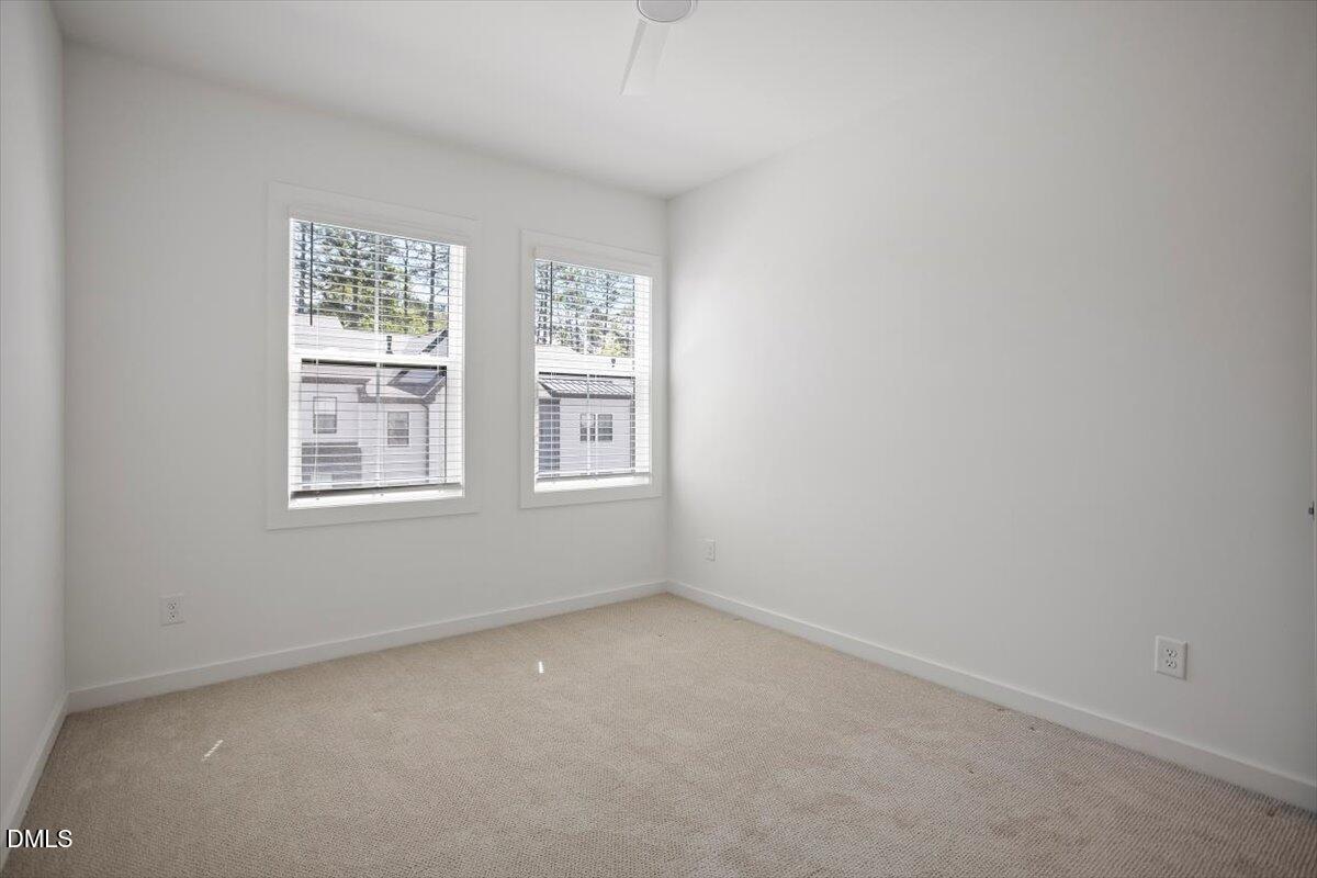 6419 Tanner Oak Lane Raleigh, NC 27613 - Photo 35 of 39 an empty room with windows