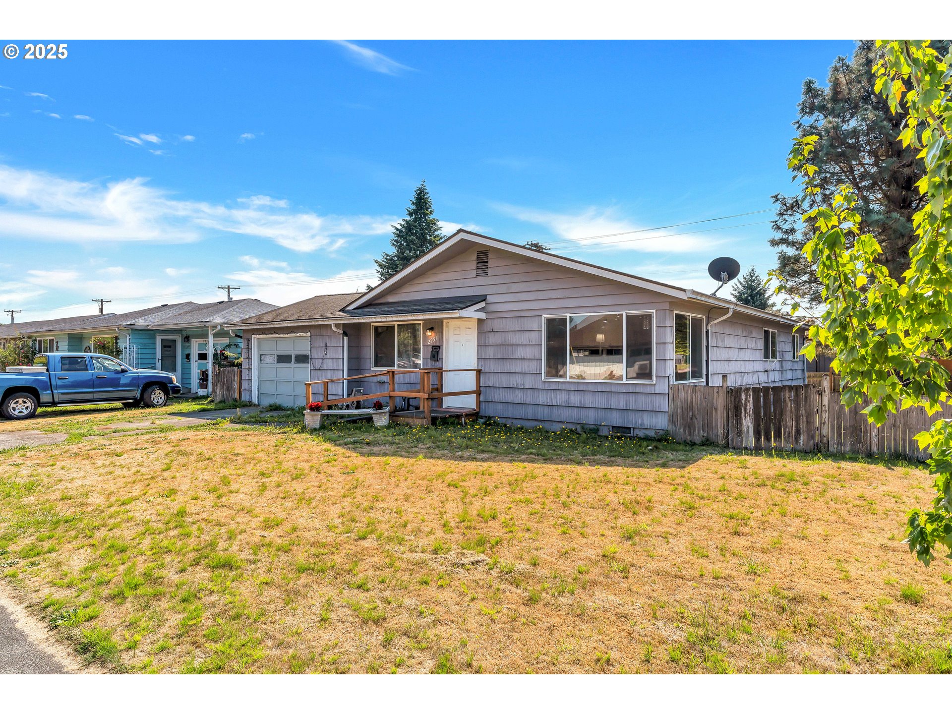 2951 Douglas Street Longview, WA 98632 - Photo 2 of 25 a front view of a house with a yard