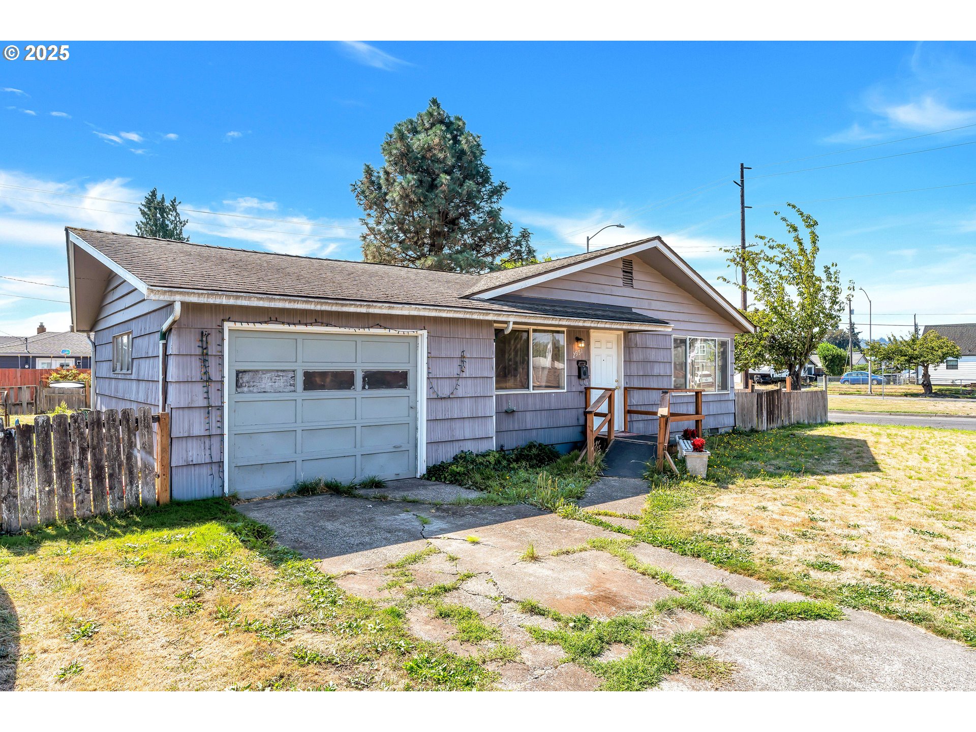 2951 Douglas Street Longview, WA 98632 - Photo 3 of 25 a view of a house with backyard and sitting area