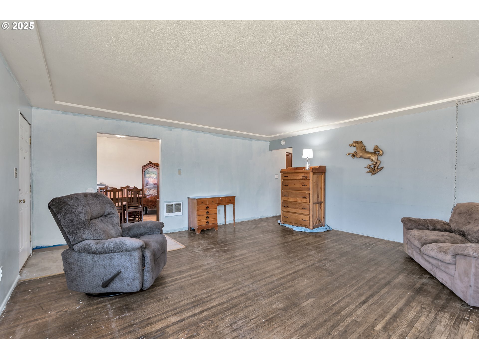 2951 Douglas Street Longview, WA 98632 - Photo 7 of 25 a living room with furniture and wooden floor