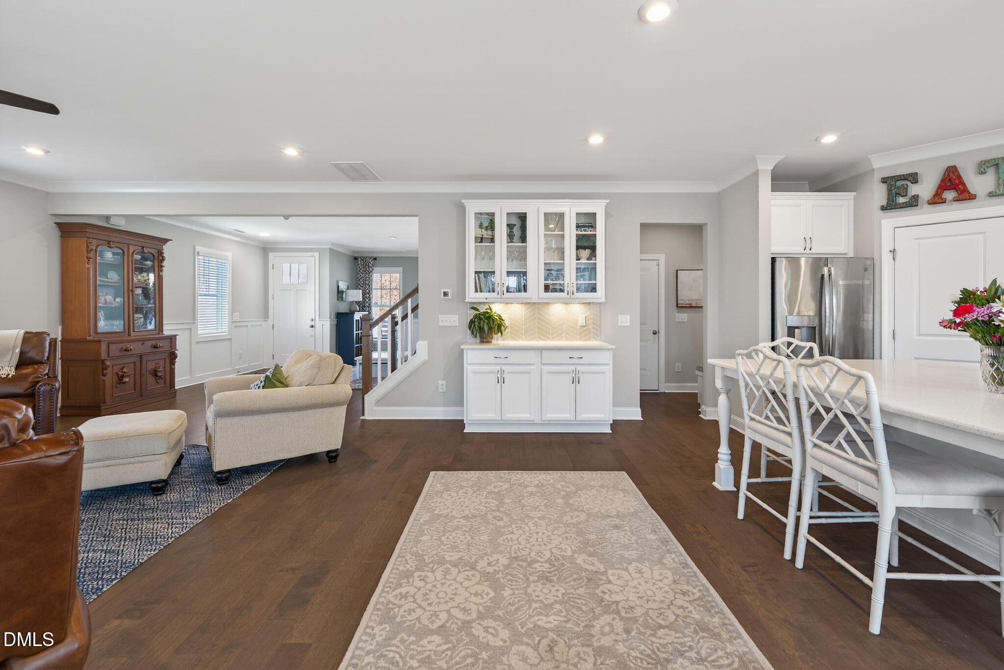 10009 Leesville Grove Drive Raleigh, NC 27613 - Photo 16 of 66 a living room with furniture and a wooden floor