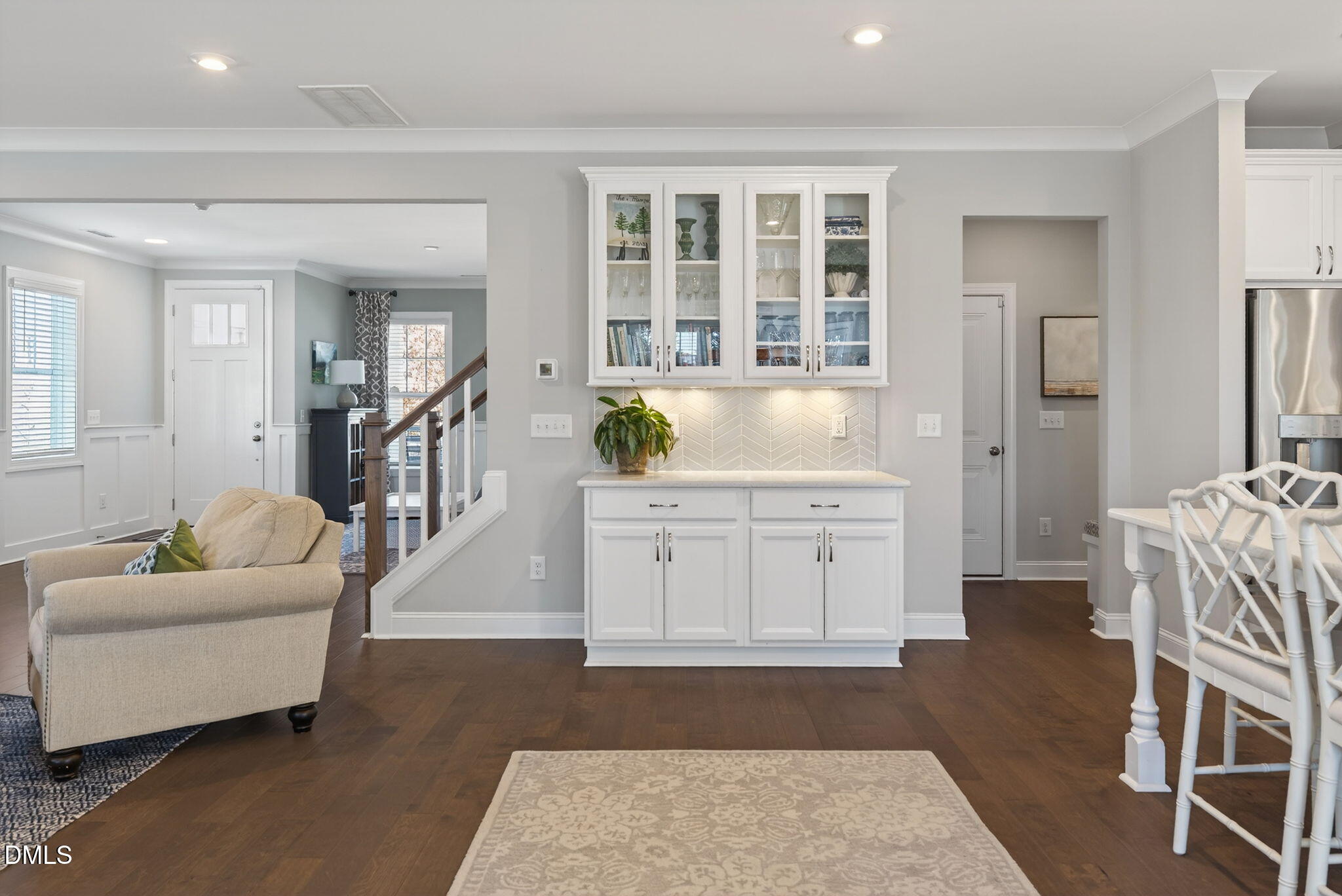10009 Leesville Grove Drive Raleigh, NC 27613 - Photo 17 of 66 a living room with furniture and a wooden floor