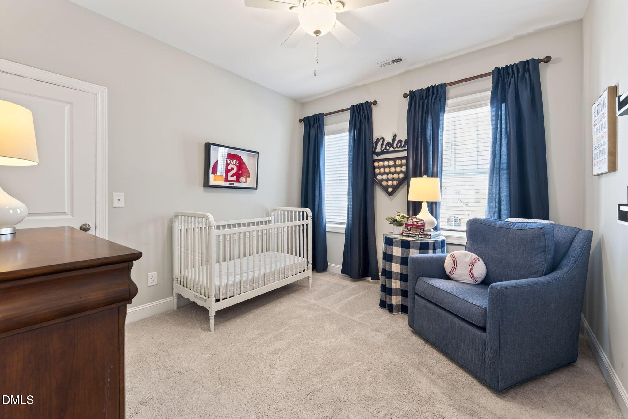 10009 Leesville Grove Drive Raleigh, NC 27613 - Photo 36 of 66 a bed room with furniture and a window