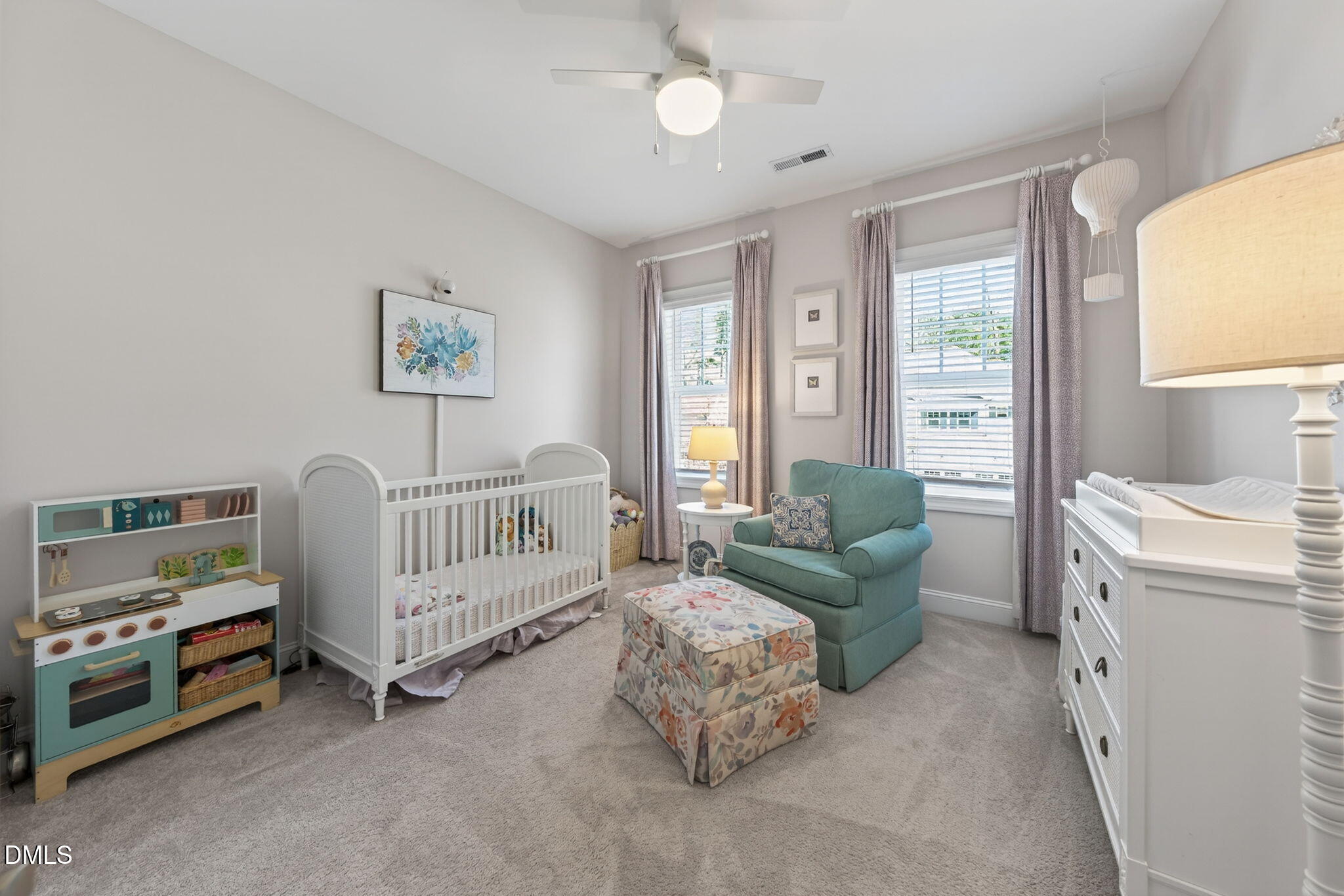 10009 Leesville Grove Drive Raleigh, NC 27613 - Photo 37 of 66 a bedroom with furniture and a large window