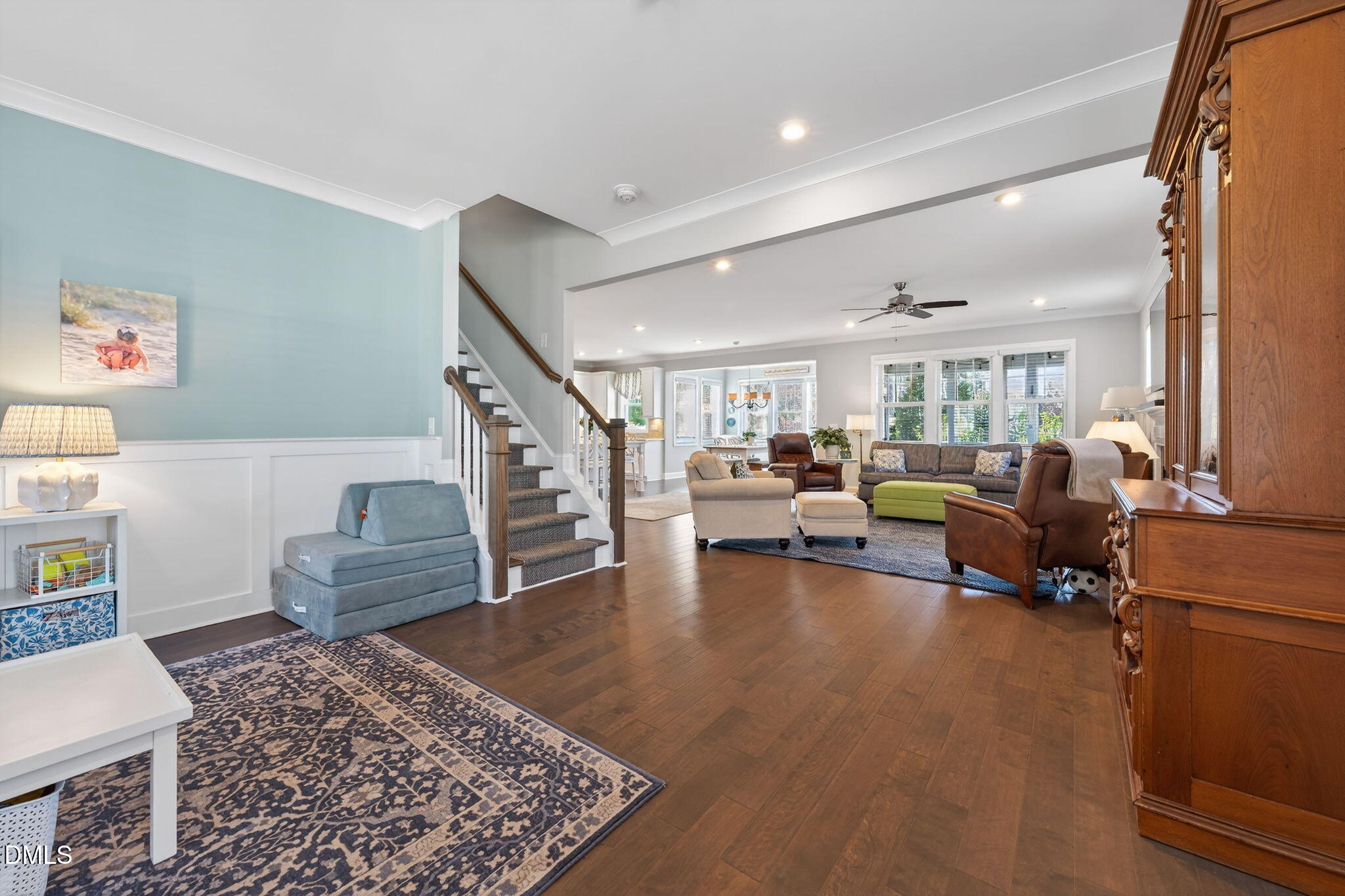 10009 Leesville Grove Drive Raleigh, NC 27613 - Photo 5 of 66 a living room with furniture and a rug