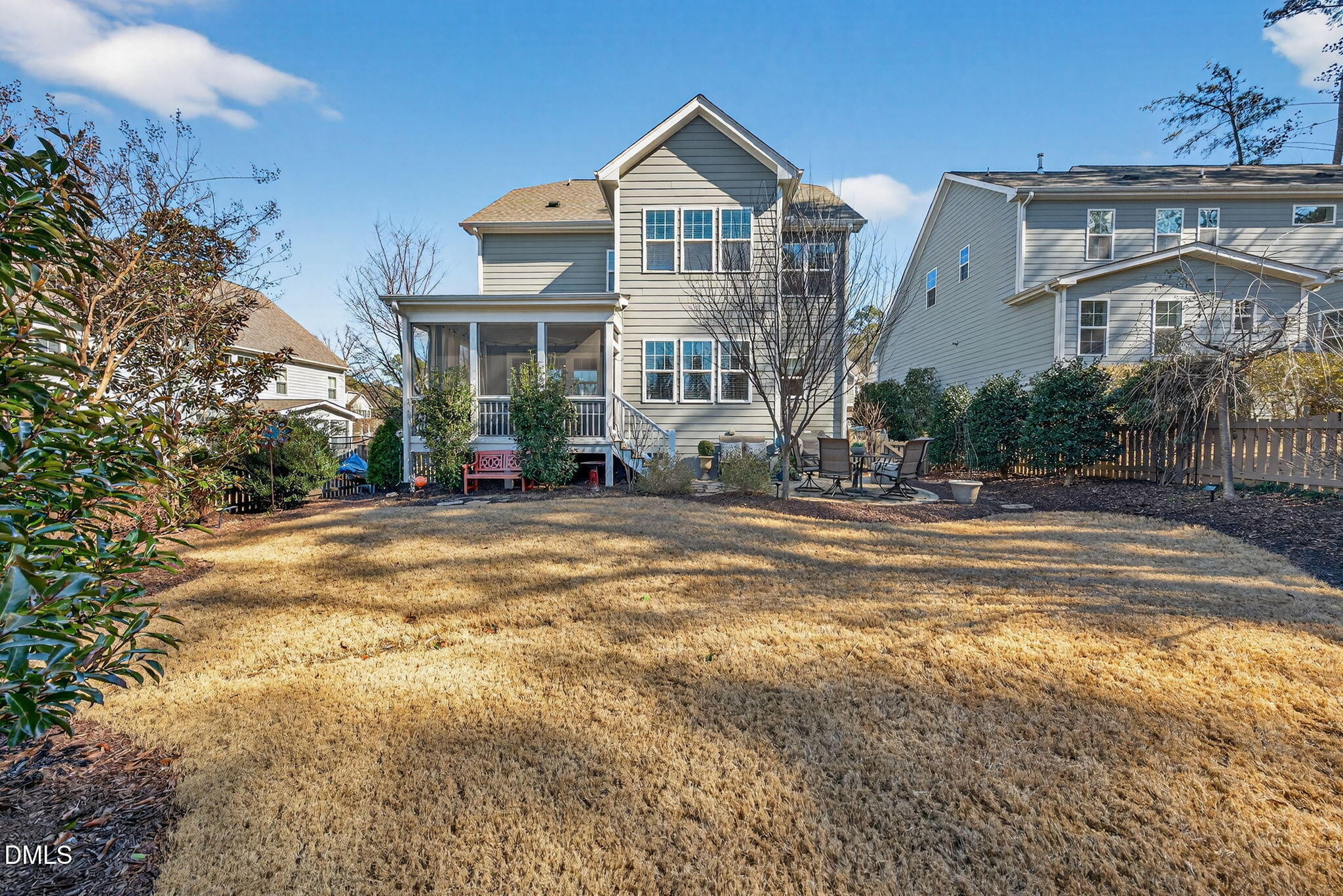 10009 Leesville Grove Drive Raleigh, NC 27613 - Photo 55 of 66 a front view of a house with a yard