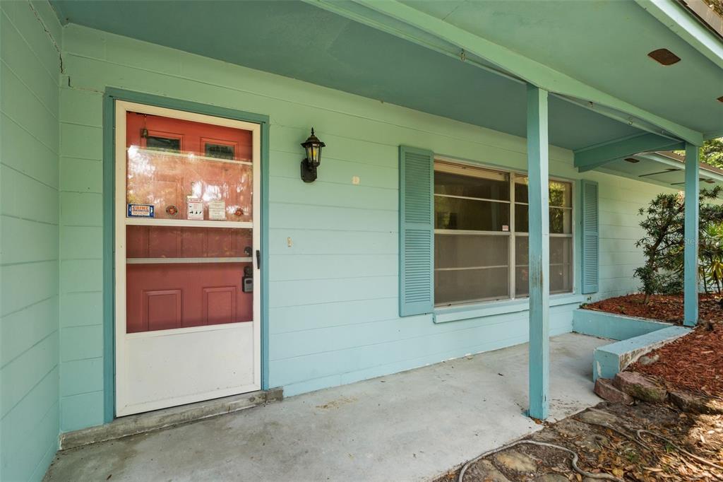 4825 Southwest 19th Street Gainesville, FL 32608 - Photo 34 of 40 a view of front door of a house