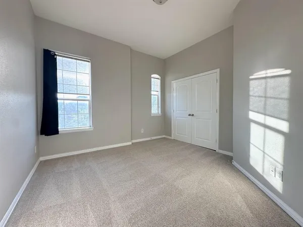 an empty room with windows