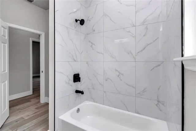 a bathroom with a bathtub