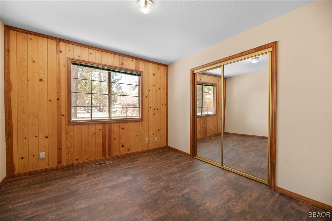 252 Riverside Avenue Sugarloaf, CA 92386 - Photo 13 of 29 an empty room with windows and closet