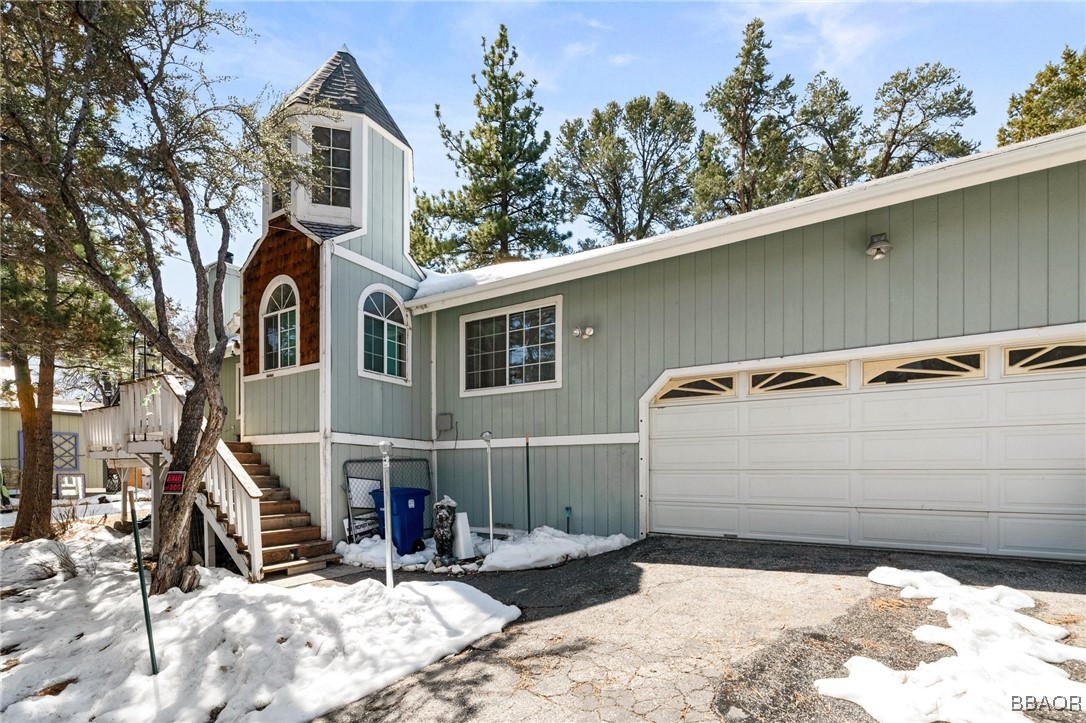252 Riverside Avenue Sugarloaf, CA 92386 - Photo 2 of 29 a view of a house with a backyard