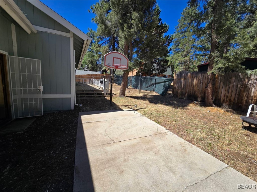 252 Riverside Avenue Sugarloaf, CA 92386 - Photo 29 of 29 a childrens park with lots of swings and slides