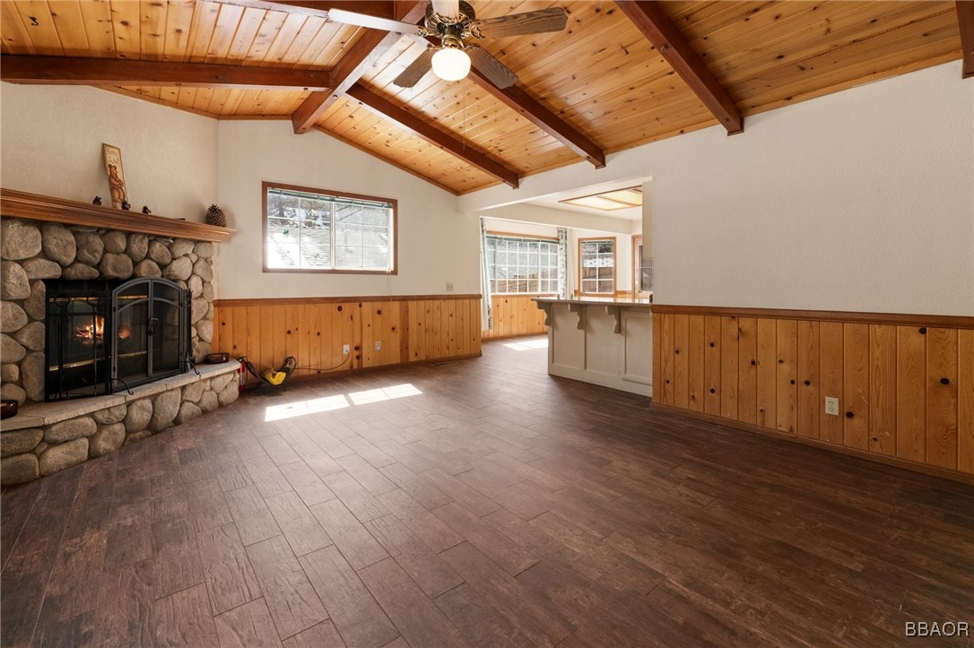 252 Riverside Avenue Sugarloaf, CA 92386 - Photo 3 of 29 a view of a room with wooden floors and fireplace