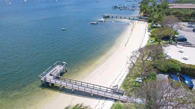 a view of a lake with a bench in balcony