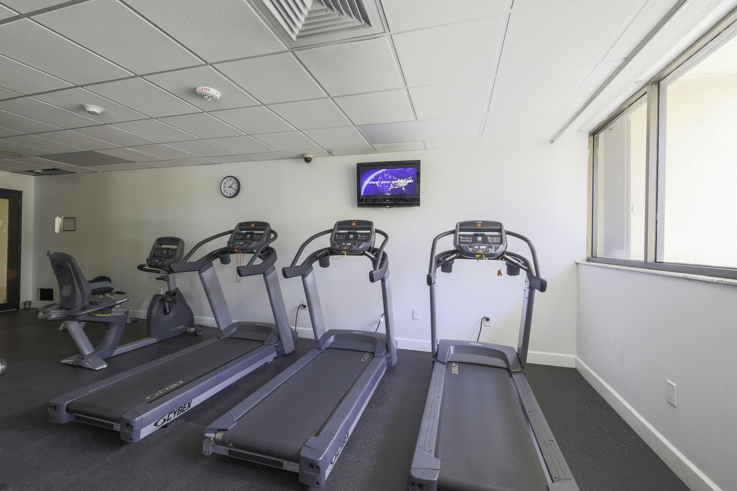 5600 North Flagler Drive, Unit 2701 West Palm Beach, FL 33407 - Photo 30 of 39 a view of a room with gym equipment