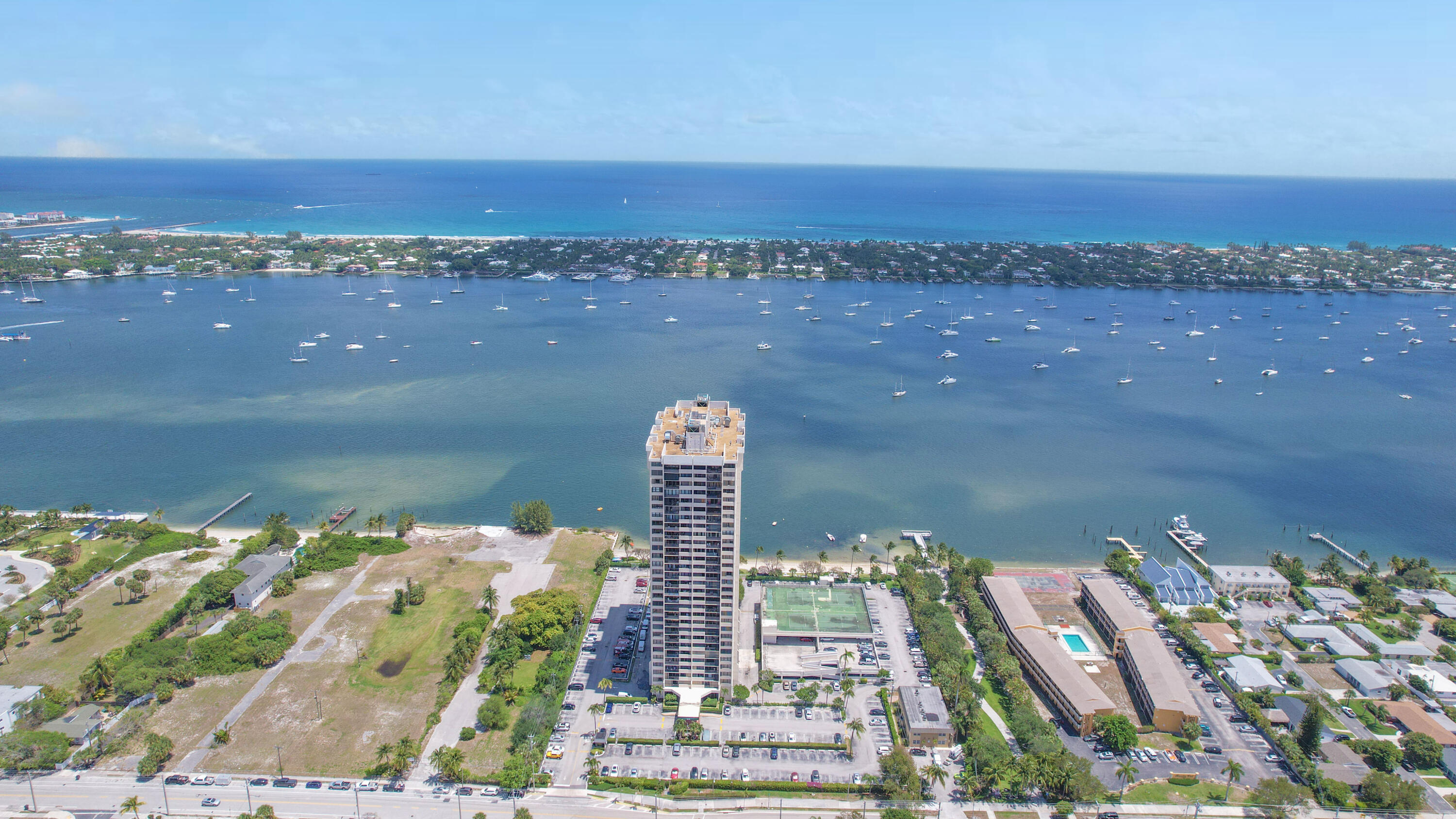 5600 North Flagler Drive, Unit 2701 West Palm Beach, FL 33407 - Photo 4 of 39 a view of a city with a lake