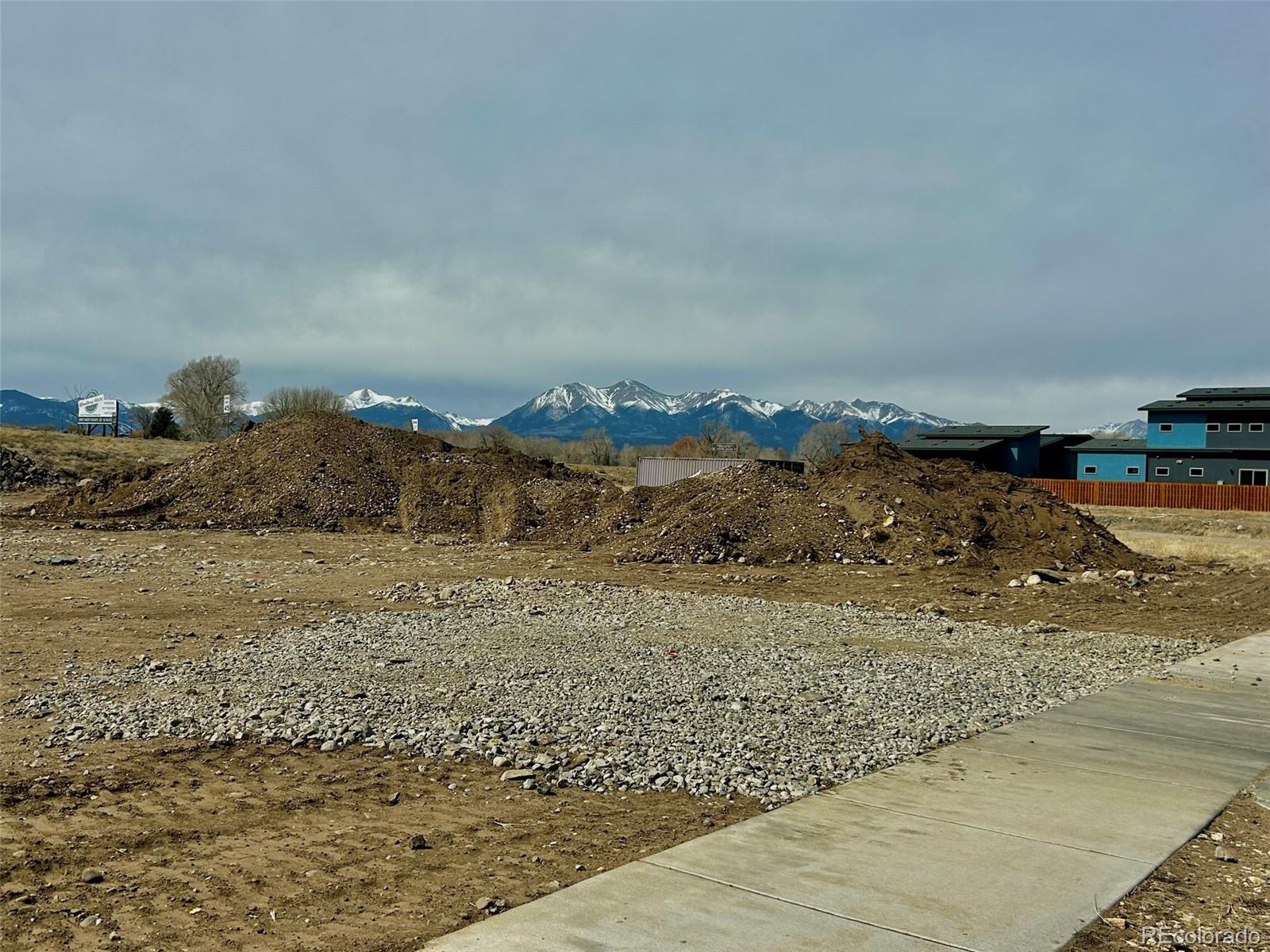 6656 Cleora Road Salida, CO 81201 - Photo 5 of 7 a view of a dry yard with wooden fence