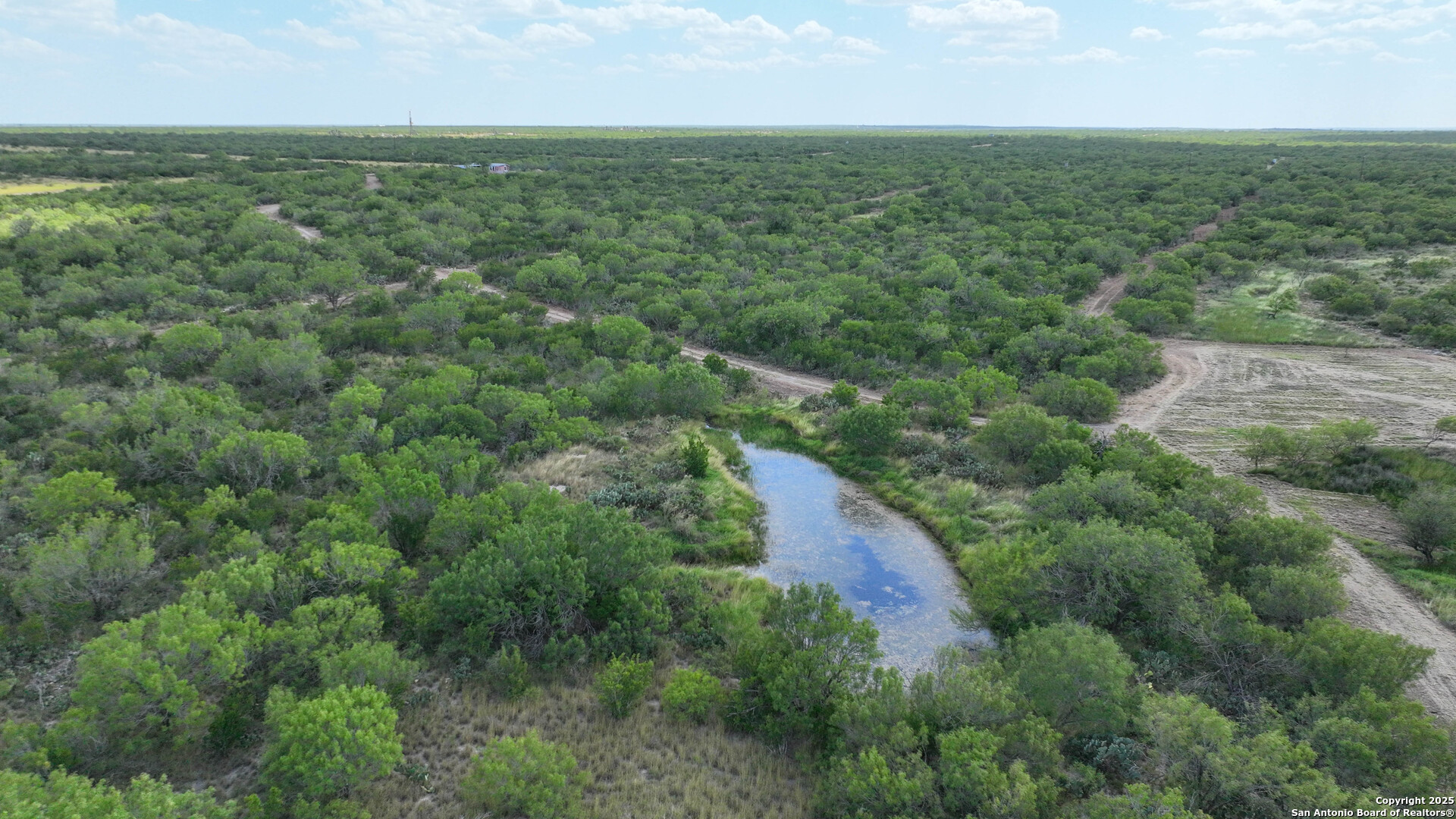 0 Cameron Lane Fowlerton, TX 78021 - Photo 12 of 16 an aerial view of residential houses with outdoor space and trees